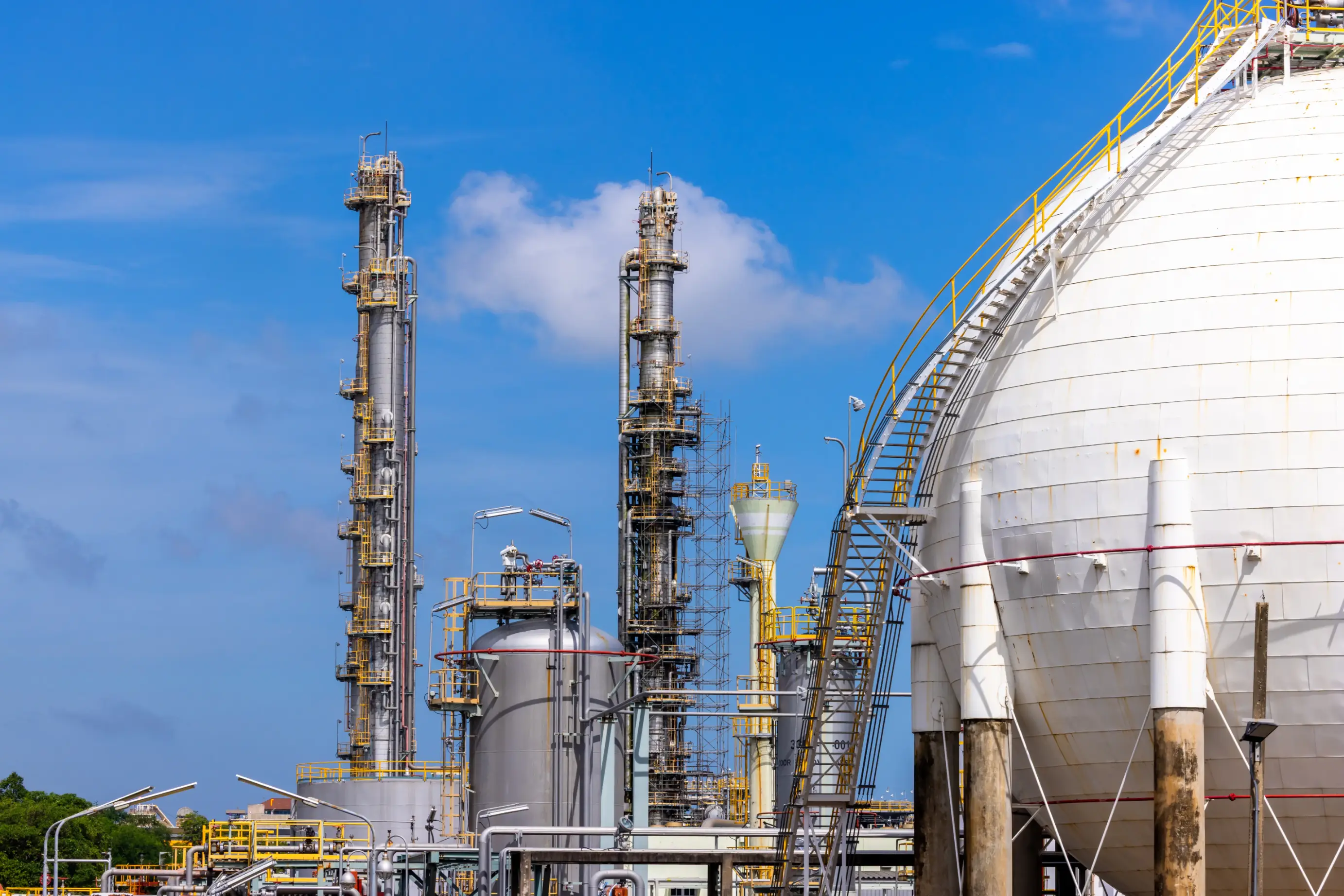 Gas separation plant at an industrial estate under a clear blue sky