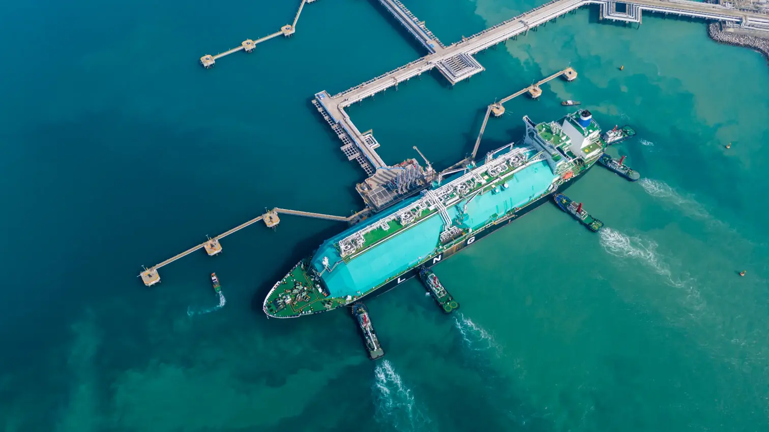 Aerial view of an LPG gas tanker ship in deep blue sea waters